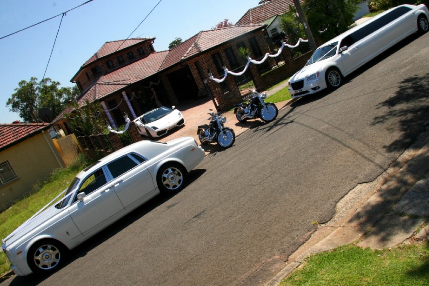 Rolls Royce Phantom, Lamborghini Spyder, Harley Davidson, 2013 Chrysler Limo